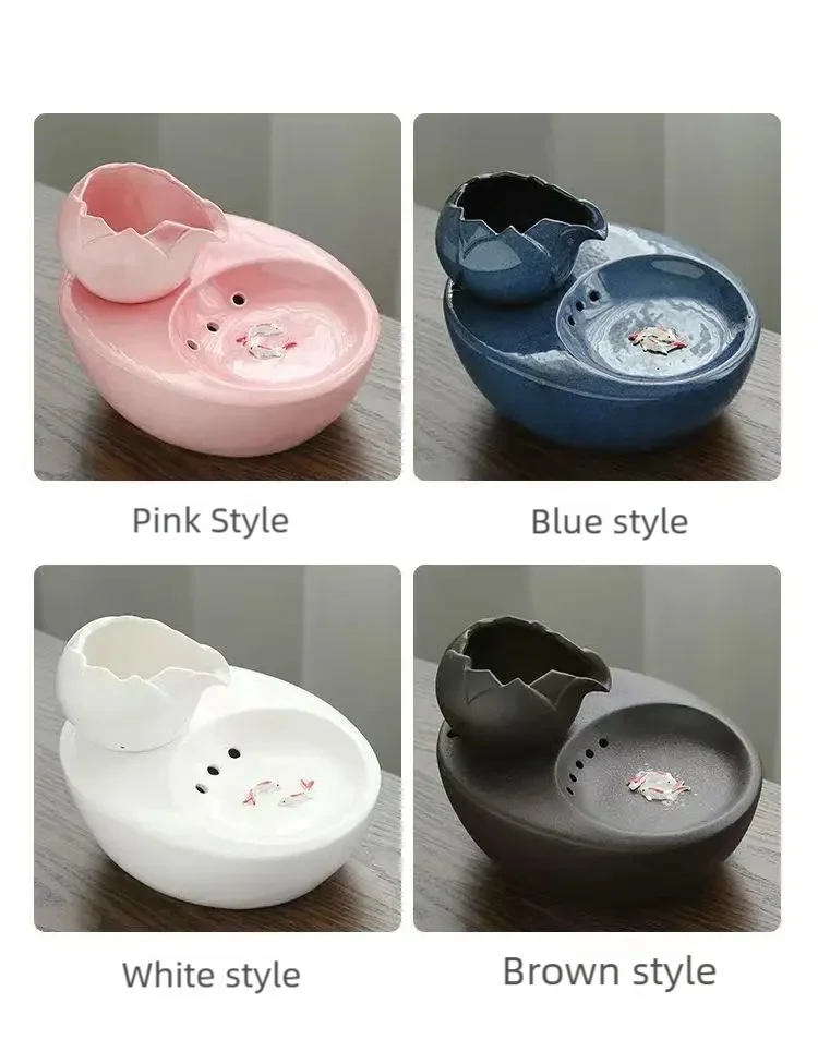 Ceramic pet water fountain with USB pump for cats and other pets to drink water.