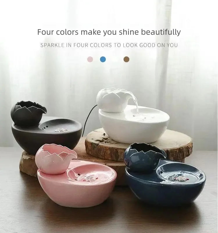 Ceramic pet water fountain with USB pump for cats and other pets to drink water.